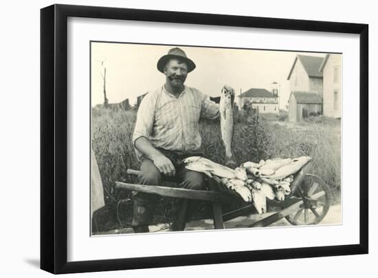 Man with Load of Fish-null-Framed Art Print