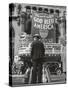 Man with Shopping Bags in Front of Million Dollar Theatre Emblazoned with God Bless America Banner-Bob Landry-Stretched Canvas