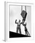 Man Working as a Rigger During Building of a Ship-George Strock-Framed Photographic Print