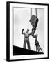 Man Working as a Rigger During Building of a Ship-George Strock-Framed Photographic Print