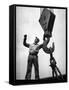 Man Working as a Rigger During Building of a Ship-George Strock-Framed Stretched Canvas