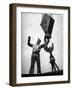 Man Working as a Rigger During Building of a Ship-George Strock-Framed Photographic Print