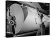 Man Working at Roller in Paper Factory-Margaret Bourke-White-Stretched Canvas