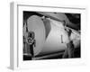 Man Working at Roller in Paper Factory-Margaret Bourke-White-Framed Photographic Print