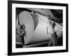 Man Working at Roller in Paper Factory-Margaret Bourke-White-Framed Photographic Print