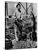 Man Working in the Shipbuilding Industry-George Strock-Stretched Canvas