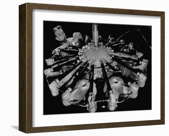 Man Working on Construction of an Aircraft Engine-Carl Mydans-Framed Photographic Print