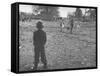 Man Working on the Farm after it Has Rained-null-Framed Stretched Canvas