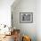 Man Working on the Farm after it Has Rained-null-Framed Photographic Print displayed on a wall