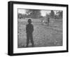 Man Working on the Farm after it Has Rained-null-Framed Photographic Print