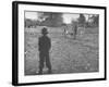 Man Working on the Farm after it Has Rained-null-Framed Photographic Print