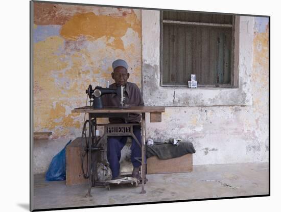 Man Works His Sewing Machine on Ibo Island, Part of the Quirimbas Archipelago, Mozambique-Julian Love-Mounted Photographic Print