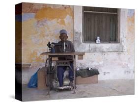 Man Works His Sewing Machine on Ibo Island, Part of the Quirimbas Archipelago, Mozambique-Julian Love-Stretched Canvas