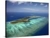 Mana Island and Coral Reef, Mamanuca Islands, Fiji-David Wall-Stretched Canvas