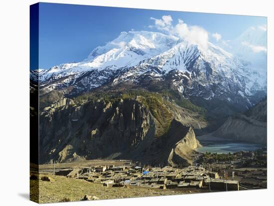 Manang Village and Annapurna Himalayan Range, Marsyangdi River Valley, Gandaki, Nepal-Jochen Schlenker-Stretched Canvas