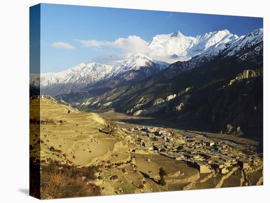 Manang Village and Annapurna Himalayan Range, Marsyangdi River Valley, Gandaki, Nepal-Jochen Schlenker-Stretched Canvas