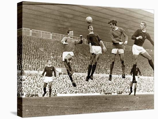 Manchester United vs. Arsenal, Football Match at Old Trafford, October 1967-null-Stretched Canvas