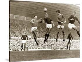 Manchester United vs. Arsenal, Football Match at Old Trafford, October 1967-null-Stretched Canvas