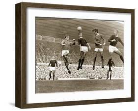 Manchester United vs. Arsenal, Football Match at Old Trafford, October 1967-null-Framed Premium Photographic Print