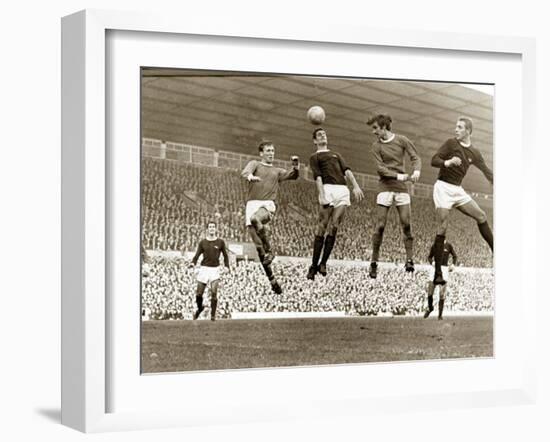 Manchester United vs. Arsenal, Football Match at Old Trafford, October 1967-null-Framed Premium Photographic Print