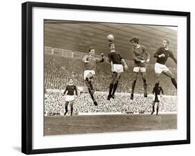 Manchester United vs. Arsenal, Football Match at Old Trafford, October 1967-null-Framed Premium Photographic Print