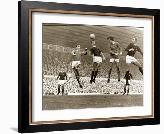 Manchester United vs. Arsenal, Football Match at Old Trafford, October 1967-null-Framed Photographic Print