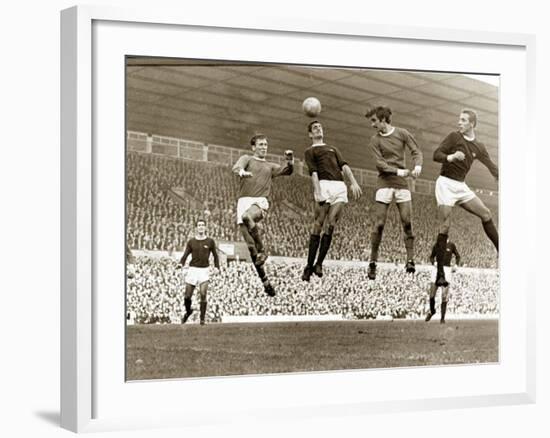 Manchester United vs. Arsenal, Football Match at Old Trafford, October 1967-null-Framed Photographic Print