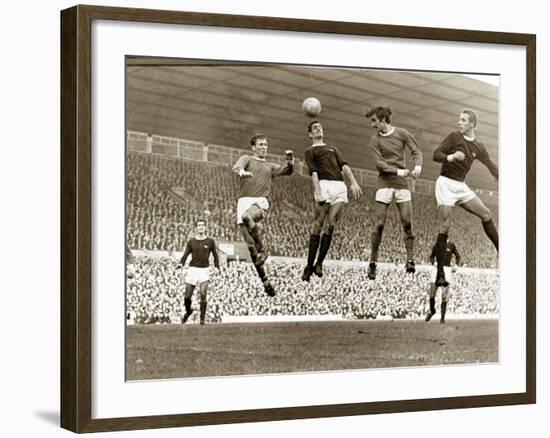 Manchester United vs. Arsenal, Football Match at Old Trafford, October 1967-null-Framed Photographic Print