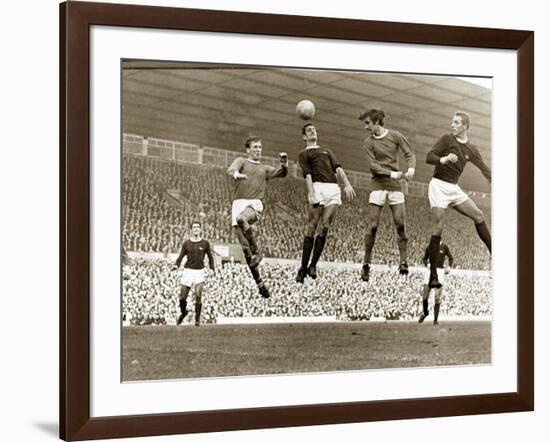 Manchester United vs. Arsenal, Football Match at Old Trafford, October 1967-null-Framed Photographic Print