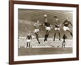 Manchester United vs. Arsenal, Football Match at Old Trafford, October 1967-null-Framed Photographic Print