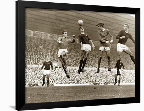 Manchester United vs. Arsenal, Football Match at Old Trafford, October 1967-null-Framed Photographic Print