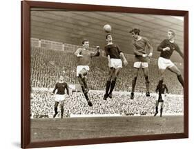 Manchester United vs. Arsenal, Football Match at Old Trafford, October 1967-null-Framed Photographic Print