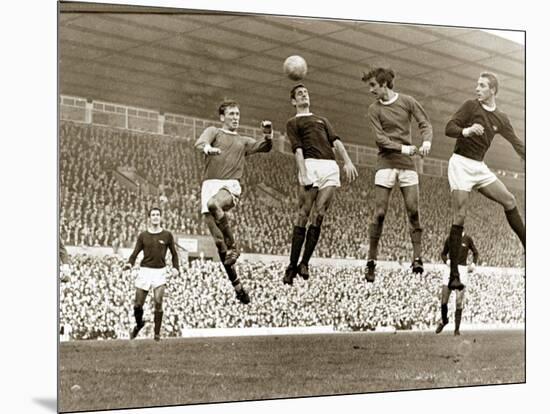 Manchester United vs. Arsenal, Football Match at Old Trafford, October 1967-null-Mounted Photographic Print