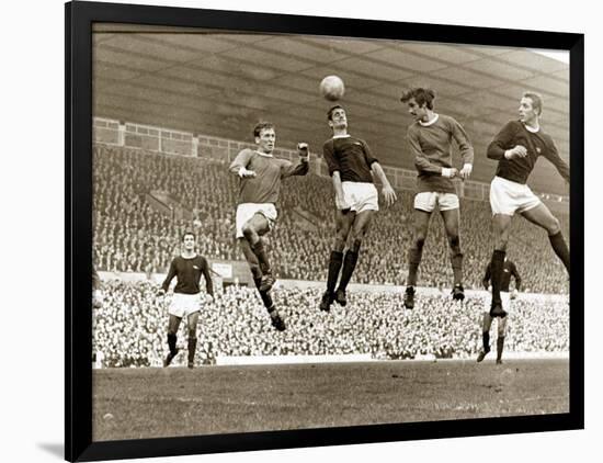 Manchester United vs. Arsenal, Football Match at Old Trafford, October 1967-null-Framed Photographic Print