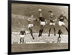 Manchester United vs. Arsenal, Football Match at Old Trafford, October 1967-null-Framed Photographic Print