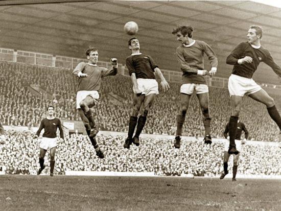 Manchester United vs. Arsenal, Football Match at Old Trafford, October  1967' Photographic Print | AllPosters.com