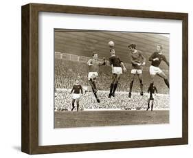 Manchester United vs. Arsenal, Football Match at Old Trafford, October 1967-null-Framed Photographic Print