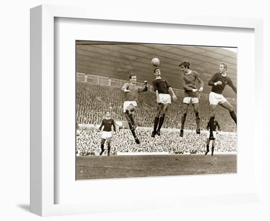 Manchester United vs. Arsenal, Football Match at Old Trafford, October 1967-null-Framed Photographic Print