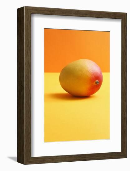 Mango on Coloured Background-Kr?ger and Gross-Framed Photographic Print