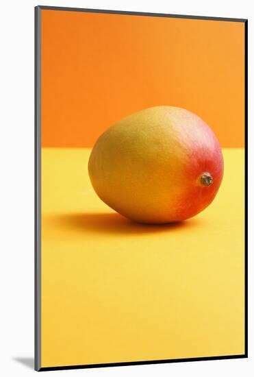 Mango on Coloured Background-Kr?ger and Gross-Mounted Photographic Print