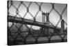 Manhattan Bridge in Black and White Through Chain Fence-null-Stretched Canvas