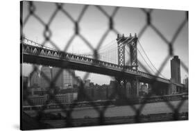 Manhattan Bridge in Black and White Through Chain Fence-null-Stretched Canvas