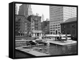 Manhattan's East River Downtown Skyport - Grumman and Fairchild Amphibious Planes-Margaret Bourke-White-Framed Stretched Canvas