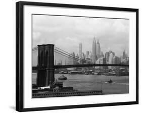 Manhattan Skyline And Brooklyn Bridge-Bettmann-Framed Photographic Print