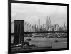 Manhattan Skyline And Brooklyn Bridge-Bettmann-Framed Photographic Print