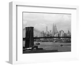 Manhattan Skyline And Brooklyn Bridge-Bettmann-Framed Photographic Print