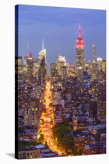 Manhattan skyline at dusk with the Empire State Building, New York City, United States of America, -Fraser Hall-Stretched Canvas