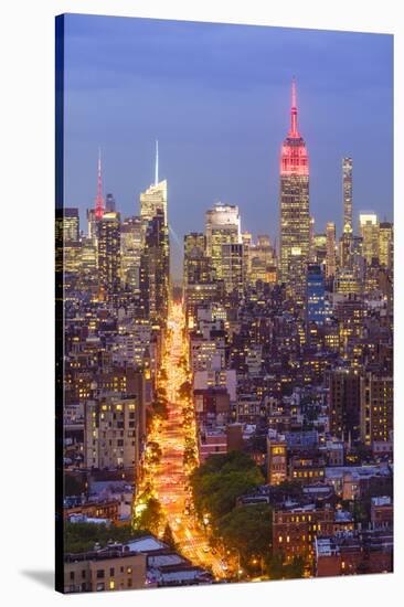 Manhattan skyline at dusk with the Empire State Building, New York City, United States of America, -Fraser Hall-Stretched Canvas