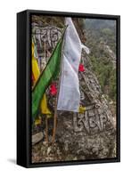 Mani Stone and prayer flags along a trail, Nepal.-Lee Klopfer-Framed Stretched Canvas
