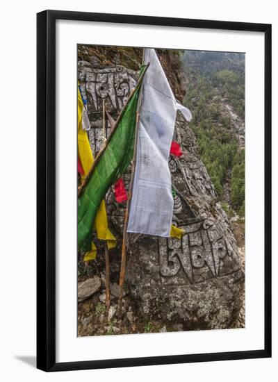 Mani Stone and prayer flags along a trail, Nepal.-Lee Klopfer-Framed Photographic Print